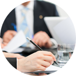 Business individuals gathered around a table